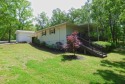 Built for comfort and ease of living, this home on Lake Navajo for sale in Cherokee Village Arkansas Sharp County County on GolfHomes.com