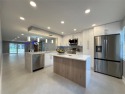 Beautifully renovated 2-bedroom, 2-bath first-floor corner unit for sale in Coconut Creek Florida Broward County County on GolfHomes.com