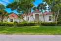 Discover island living at its finest in this elegant 4-bedroom for sale in Sanibel Florida Lee County County on GolfHomes.com
