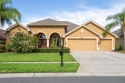 Light, Bright and Spacious 4 bedroom, 4 bath  pool home built by for sale in Land O Lakes Florida Pasco County County on GolfHomes.com