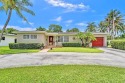 Beautifully maintained 3 bedroom, 2 bath pool home with 1 car for sale in Hollywood Florida Broward County County on GolfHomes.com