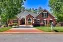 Stately home with stunning views overlooking Spalding Lake for sale in Aiken South Carolina Aiken County County on GolfHomes.com