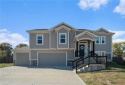 Step into this beautifully designed, like-new split entry home for sale in Smithville Missouri Clay County County on GolfHomes.com