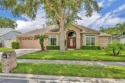 Welcome to this beautifully maintained 4-bedroom, 3-bathroom for sale in Oviedo Florida Seminole County County on GolfHomes.com