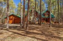 Discover the charm of this fully furnished tranquil log cabin for sale in Pinetop Arizona Navajo County County on GolfHomes.com