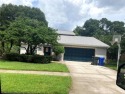 Discover this spacious two-story pool home tucked away in the for sale in Tampa Florida Hillsborough County County on GolfHomes.com