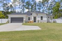 WHY BUY NEW, when you can benefit from owning this 2 year old for sale in Palm Coast Florida Flagler County County on GolfHomes.com