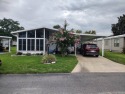 HOME FEATURES;  This open floor plan with cathedral ceilings for sale in Leesburg Florida Lake County County on GolfHomes.com