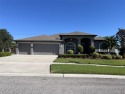 Welcome to this meticulously maintained semi-custom home in the for sale in Sun City Center Florida Hillsborough County County on GolfHomes.com