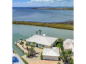 WATERFRONT home with uncompromised VIEWS and ANGLERS' paradise for sale in Port Aransas Texas Nueces County County on GolfHomes.com