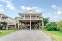 Location, location, location... plus mailbox money! This for sale in Dauphin Island Alabama Mobile County County on GolfHomes.com