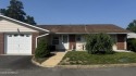 Spacious Winfield model end-unit duplex featuring 2 bedrooms and for sale in Lakewood New Jersey Ocean County County on GolfHomes.com