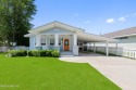 Nestled on one of the most desirable streets in Old Town, this for sale in Bay Saint Louis Mississippi Hancock County County on GolfHomes.com