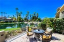 Welcome to The Lakes Country Club! This South-facing, waterfront for sale in Palm Desert California Riverside County County on GolfHomes.com