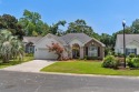 Nestled within the Intracoastal Waterway community of The Oaks for sale in Little River South Carolina Horry County County on GolfHomes.com