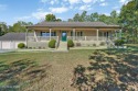 Lake-view living on a wooded acre-this 1,800 SF, single-level for sale in Crossville Tennessee Cumberland County County on GolfHomes.com