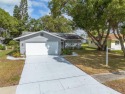 You do not want to miss out on this home in the highly for sale in Palm Harbor Florida Pinellas County County on GolfHomes.com