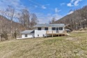 This totally updated home, nestled in the mountains between for sale in Barnardsville North Carolina Buncombe County County on GolfHomes.com
