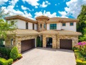 Nestled on the golf course & water in Parkland Golf & Country for sale in Parkland Florida Broward County County on GolfHomes.com