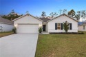 This home has an assumable mortgage with a current interest rate for sale in Ocala Florida Marion County County on GolfHomes.com