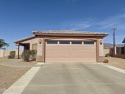 Enjoy beautiful interior and exterior views of the Superstition for sale in Gold Canyon Arizona Pinal County County on GolfHomes.com