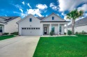 Welcome to a home that captures the relaxed elegance of coastal for sale in Murrells Inlet South Carolina Horry County County on GolfHomes.com