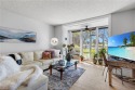 Upgraded, airy, and chic first-floor condo with tranquil lake for sale in Naples Florida Collier County County on GolfHomes.com