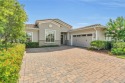 EXQUISITE WATERFRONT GOLF COURSE POOL HOME IN EAGLE CREEK -- for sale in Orlando Florida Orange County County on GolfHomes.com