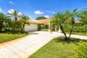 Elegance & comfort can be found throughout this well designed for sale in Tequesta Florida Martin County County on GolfHomes.com
