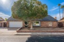 This charming Dobson Ranch home is freshly painted throughout for sale in Mesa Arizona Maricopa County County on GolfHomes.com