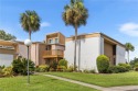 Welcome to this beautiful and light-filled 2-bedroom, 2-bathroom for sale in Mount Dora Florida Lake County County on GolfHomes.com
