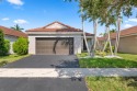 Welcome to this beautifully updated 3BR/2BA one-story home in for sale in Weston Florida Broward County County on GolfHomes.com