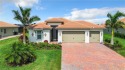 Discover a realm of refined living in this luxurious 3-bedroom for sale in Naples Florida Collier County County on GolfHomes.com