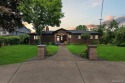 Welcome to your water oasis!  Beautiful all brick ranch with for sale in Grosse Ile Michigan Wayne County County on GolfHomes.com