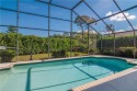 You may be surprised by the price of this 4-bedroom pool-home in for sale in Estero Florida Lee County County on GolfHomes.com