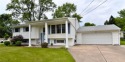 This charming bi-level home offers 3 bedrooms and 2 full baths for sale in Twinsburg Ohio Summit County County on GolfHomes.com