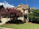 Farmhouse-Inspired Entertainer's Dream with a Fully Finished for sale in Cumming Georgia Forsyth County County on GolfHomes.com