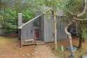 Nestled within this serene mountain community, this stunning for sale in Lake Harmony Pennsylvania Carbon County County on GolfHomes.com