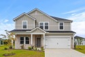 Welcome to this beautifully designed 5-bedroom, 3-bathroom home for sale in Longs South Carolina Horry County County on GolfHomes.com