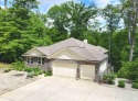 Experience refined lakefront living in this meticulously crafted for sale in Martinsville Indiana Morgan County County on GolfHomes.com