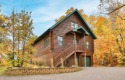 Enjoy relaxing on the large 10x30 deck overlooking the 11th hole for sale in Garrison Minnesota Mille Lacs County County on GolfHomes.com