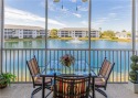 This impeccably maintained end-unit offers breathtaking lake for sale in Naples Florida Collier County County on GolfHomes.com