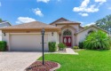 LOCATED IN TIMBER GREENS A 55+ GATED GOLF COMMUNITY...This move for sale in New Port Richey Florida Pasco County County on GolfHomes.com