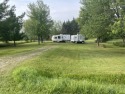 Beautifully maintained lot with ALL hook-ups for camping for sale in Gladwin Michigan Gladwin County County on GolfHomes.com