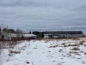 Great Location!  And this one comes with 2 large garages to for sale in Madawaska Maine Aroostook County County on GolfHomes.com