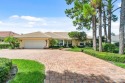 Nestled in the prestigious Marlwood Estates of PGA National for sale in Palm Beach Gardens Florida Palm Beach County County on GolfHomes.com