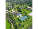 Experience the Palm Beach lifestyle in Wellington. This for sale in Wellington Florida Palm Beach County County on GolfHomes.com