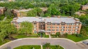 This updated ground-floor end-unit condo in Mallard Cove offers for sale in Arlington Heights Illinois Cook County County on GolfHomes.com