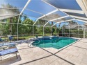 You will love this beautifully renovated Pool area with south for sale in Estero Florida Lee County County on GolfHomes.com