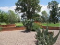 Enjoy the view of the golf course plus a beautiful mountain view for sale in Green Valley Arizona Pima County County on GolfHomes.com